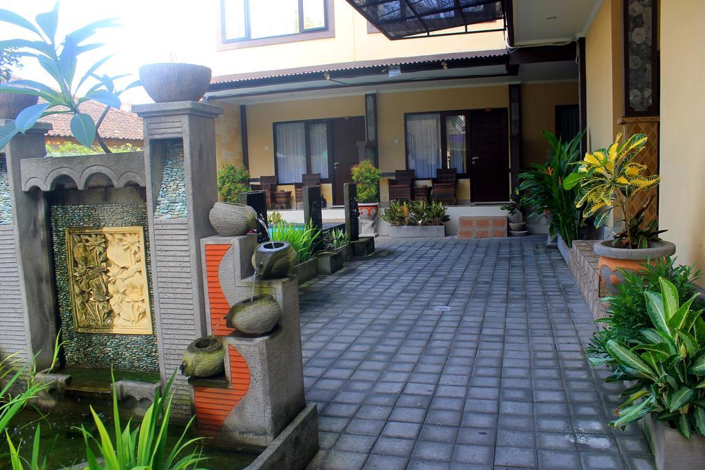 Taxa Uma Wisma tamu