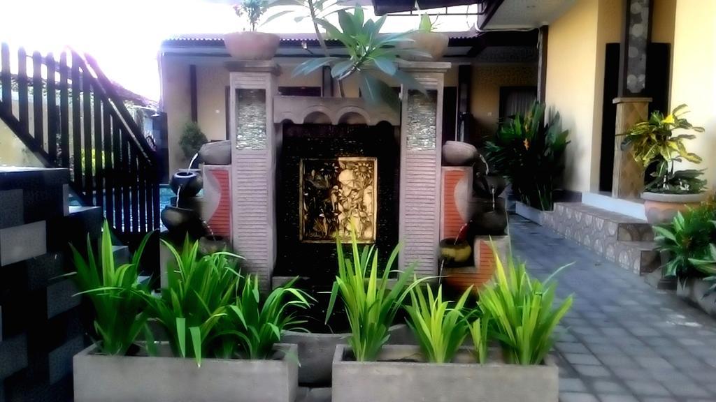 Taxa Uma Wisma tamu